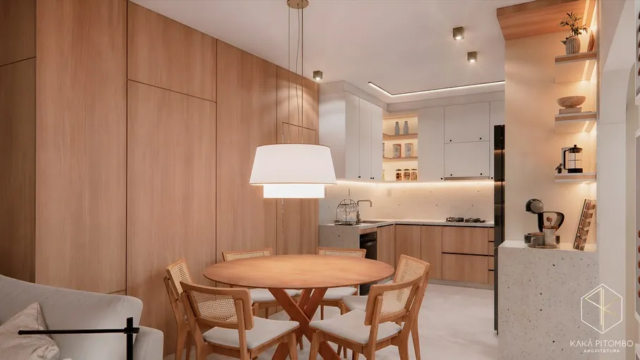 Cozinha integrada em madeira com mesa redonda e porta coplanar nivelada ao painel